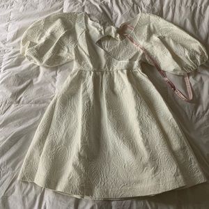 White brocade mini dress